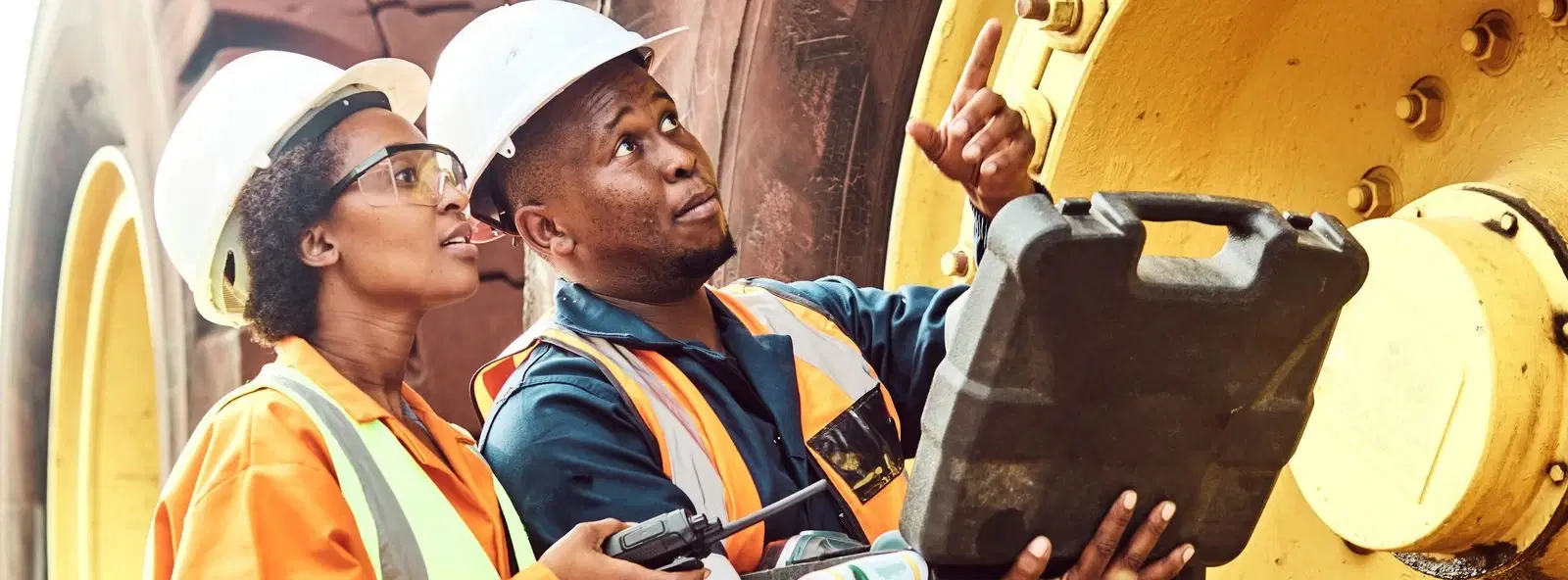 MRG technicians inspecting heavy equipment